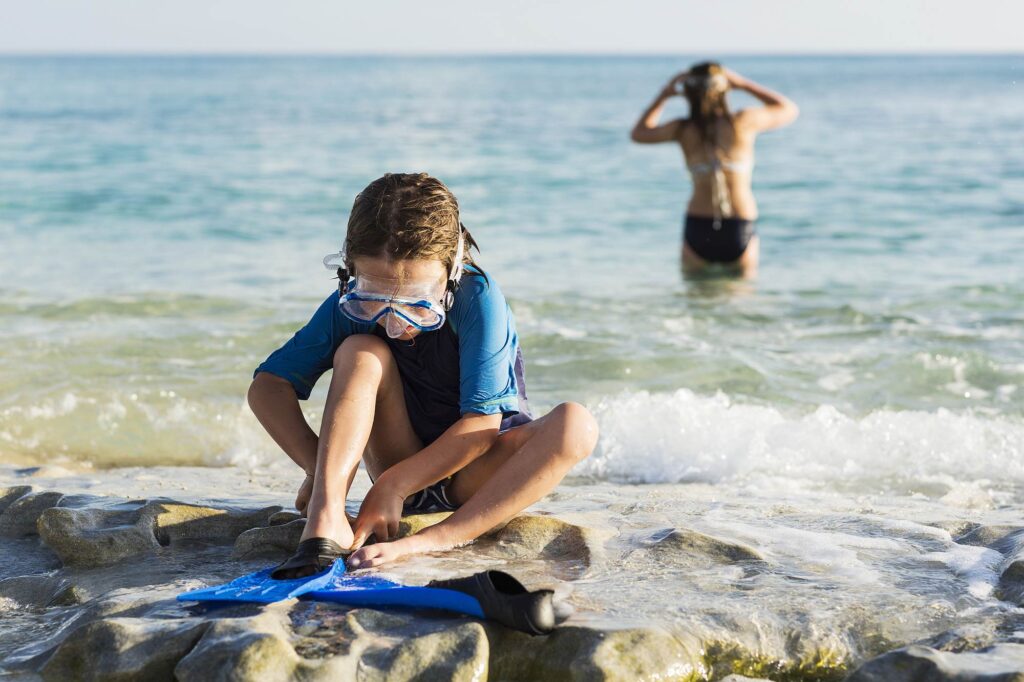 Kind Schwimmflossen